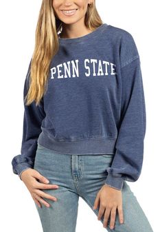 Make your way to the big game in this Penn State Nittany LionsWomens Navy Blue Campus Crop Crew Sweatshirt! This Nittany Lions Long Sleeve Sweatshirt features a screen print team name and logo. Stay warm and comfortable with this Womens Penn State Nittany Lions Crew Sweatshirt. Dropped shoulder, Crew neck, Puff sleeves, Straight hem, 60% COTTON / 40% POLYESTER, 4 Blue Casual Tops For Game Day, Blue Varsity Tops For Game Day, Blue Tops For Fall Game Day, Blue Collegiate Sweatshirt For Campus, Blue Varsity Style Tops, Navy Long Sleeve Collegiate Top, Blue Crew Neck Top For Campus, Blue Varsity Tops For Campus, Blue Varsity Top For Campus Wear