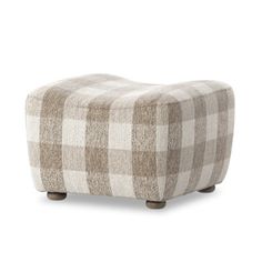 the footstool is made out of fabric and has a checkered pattern on it