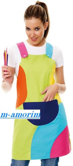 a woman in an apron holding two pencils