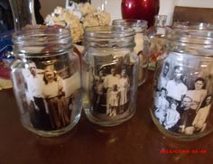 there are many glass jars with pictures on them