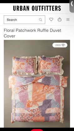 a bed with an orange and pink quilt on it's cover is featured in the urban outfitters website