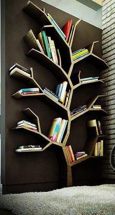 a tree shaped book shelf with books on it