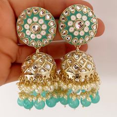 Bollywood Trendy Big Meenakari Pearl Jhumka/Jhumka Earrings/kundan Earrings/Indian/Punjabi/Pakistani Jewelry/Bridal/Indian Wedding Color, shades, texture displayed may slightly vary from the actual product due to digital image limitations. We request you to consider these minor variations. Please expect the possibility of some slight imperfections when buying handmade jewelry. If you have any questions, please contact us. Arrives in gift box. Please let me know if you have any questions. Thank y Green Zari Work Jhumkas For Diwali, Anarkali Style Kundan Jhumkas, Green Gota Work Jhumkas For Diwali, Festive Green Gota Work Jhumkas, Anarkali Jhumkas With Latkans For Diwali, Heavy Anarkali Jhumkas For Wedding, Heavy Anarkali Style Jhumkas For Wedding, Bollywood Style Kundan Jhumkas With Zari Work, Anarkali Bridal Earrings With Meenakari For Festive Occasions