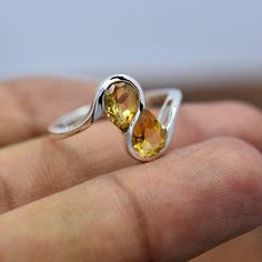 Natural Citrine Gemstone Ring in 925 Sterling Silver, Dainty Citrine Silver Two Stone Ring, Minimalist Ring, Engagement Ring Bridesmaid Gift This is the very beautiful handmade 925 Sterling Silver ring with Top Quality Natural Pear Cut Citrine Gemstone. This is the best gift for your love. Valentine Gifts. Citrine BIRTHSTONE November ♥️♥️♥️♥️♥️♥️♥️♥️♥️♥️♥️♥️♥️♥️♥️♥️♥️ ♥️ We accept customization contact us For Custom orders. ♥️ Product Detail :-- ♥️ Metal :- 925 Sterling Silver ♥️ Gemstone :- Citrine ♥️ Main stone creation :- Natural ♥️ Ring Size :- Choose Variation ♥️ Ring Weight :- Approx 2.5 to 3 Grams. ♥️ Metal Purity : 925 parts per 1000 ♥️♥️♥️♥️♥️♥️♥️♥️♥️♥️♥️♥️♥️♥️♥️♥️♥️♥️♥️♥️♥️♥️♥️♥️♥️♥️♥️♥️♥️♥️♥️♥️♥️♥️♥️♥️♥️♥️♥️♥️♥️♥️♥️ Healing with Citrine ♥ Happiness ♥ Prosperity ♥ Generosity ♥ Cr Yellow Sterling Silver Crystal Ring, Yellow Birthstone Ring In Sterling Silver, Yellow Sterling Silver Birthstone Ring, Citrine Crystal Promise Ring, Two Stone Ring, Citrine Birthstone, Nature Ring, Les Chakras, Etsy Bridesmaid Gifts