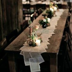 a long table with candles and flowers on it is featured in the instagram post