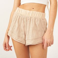 Free People Movement - Let's Go Out Shorts **Brand New With Tags! A Flouncy Layered Hem Punctuates These Stem-Showing Shorts Crafted From Breezy Fabric With A Smocked Waistband. Elastic Waistband 11" L 2" Inseam Neutral Bottoms With Built-in Shorts For Summer, Neutral Short Bottoms With Elastic Waistband, Beige Stretch Summer Bottoms, Beige Stretch Shorts For Day Out, Neutral Short Bottoms For Spring, Free People Overalls, Long Jean Shorts, Free People Romper, Mid Rise Denim Shorts