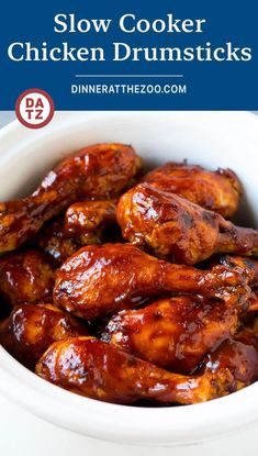 slow cooker chicken drumsticks in a white bowl with the title above it