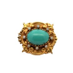 Original Art Nouveau turquoise and seed pearl brooch handcrafted in 14 karat yellow gold. The pin features a natural blue cabochon turquoise gemstone with seed pearl accents. the brooch measures 1.25 x 1.50 inches. Weight: 18 grams. Elegant Turquoise Brooches For Collectors, Luxury Turquoise Brooches For Gift, Turquoise Cabochon Brooch As A Gift, Turquoise Cabochon Brooch For Gift, Turquoise Brooch For Formal Occasions, Antique Brooches, Pearl Brooch, Seed Pearl, Turquoise Gemstone