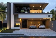 two cars parked in front of a modern house