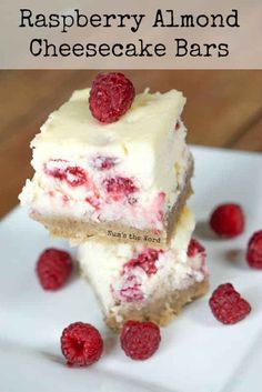 raspberry almond cheesecake bars on a white plate