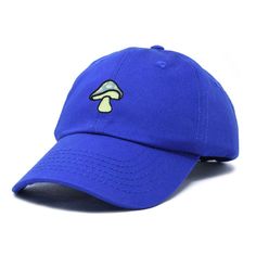 a blue hat with a green mushroom embroidered on the front and side, against a white background