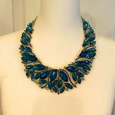 Absolutely Beautiful Blue Rhinestone Necklace With Gold For The Night On The Town Or However You Want To Wear It. Never Been Worn. Price Tag Still On Necklace. Sapphire Necklaces With Jewels For Party, Elegant Blue Crystal Necklace, Blue Jewel Necklaces For Parties, Blue Jeweled Necklaces For Party, Blue Jeweled Party Necklaces, Elegant Blue Crystal Rhinestone Necklace, Elegant Blue Rhinestone Necklace With Sparkling Stones, Elegant Blue Crystal Necklaces For Parties, Blue Jeweled Jewelry For Evening