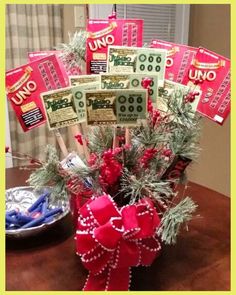 a basket filled with money and decorations on top of a table