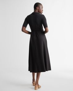 Fitted where you want it, flowy where it feels good. Our Tencel Jersey Midi Wrap Dress is the timeless classic everyone needs in their lineup. Eco-cool and all-day comfy with a rounded collar and modern midi length, it’s as soft as it is sustainable, and it’s part of our growing knit-dress collection. Also offered in sizes 1X-3X.  | Quince | Women's Tencel Jersey Midi Wrap Dress in Black, Size XL Black Maxi Dress With Flattering Silhouette For Work, Classic Black A-line Maxi Dress, Fitted Black Versatile Maxi Dress, Black Fitted Versatile Maxi Dress, Fitted Black Maxi Dress Versatile Style, Flowy Black Viscose Midi Dress, Black Flowy Viscose Midi Dress, Classic Black Midi Dress For Daywear, Black Relaxed Fit Midi Dress