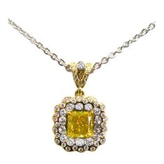 This elegant 1.10ct fancy greenish yellow radiant diamond has VVS2 clarity and is GIA certified. Surrounded by .58cts of pave, and set in 18K and platinum, this yellow diamond is sure to sparkle! The pendant comes on an 18K chain. Antique Necklaces, 18k Gold Chain, Fancy Yellow Diamond, Yellow Line, Special Necklace, Jewel Necklace, Radiant Diamond, Elegant Pendant, Antique Necklace