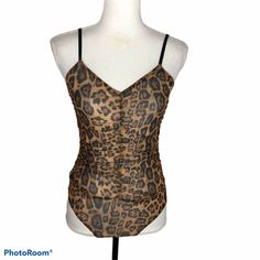 Code X Mode Small Animal Print Sheer Bodysuit Ruched Sleeveless. Condition Is "New With Tags". Measurements Taken With Item Laying Flat On Table Approximate Measurements Bust 13 Smoke Free Environment Thank You For Viewing Sleeveless Stretch Leopard Print Bodysuit, Brown Sleeveless Swimwear For Party, Sleeveless Brown Swimwear For Party, Brown Sleeveless Party Swimwear, Leopard Print Sleeveless Swimwear For Party, Black Tank Top Bodysuit, Tank Top Bodysuit, Bodycon Bodysuit, Mock Neck Bodysuit