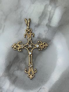 10kt yellow gold cross set with natural diamonds! Weighs 1.4dwt, is 1.50" long and .88" wide! Diamond Cross Pendants, Diamond Cross, Gold Cross, Cross Pendant, Pendant Necklaces, Natural Diamonds, Cross Necklace, Jewelry Necklace Pendant, Jewelry Necklaces