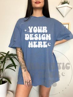 Oversized Blue T-shirt With Screen Print, Casual Denim Blue Short Sleeve T-shirt, Blue Crew Neck Shirt With Graphic Design, Washed Blue Crew Neck Tops With Screen Print, Washed Blue Graphic Print T-shirt, Relaxed Fit, Denim Blue Cotton Crew Neck Top, Oversized Blue Shirt With Screen Print, Denim Blue Crew Neck Top With Relaxed Fit, Denim Blue Relaxed Fit Crew Neck Top