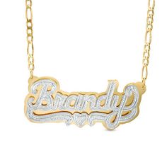 Gift yourself or someone special with this unique name necklace. Fashioned in sleek sterling silver and 24K gold plating, this three-dimensional design spells out her name, 3 to 10 characters in length, in a stylish hammered font. Beneath the name, a similarly textured heart and ribbon accent completes the look. The design is centered along an 18.0-inch figaro chain that secures with a lobster claw clasp. Custom White Nameplate Necklace, Engraved Custom Nameplate Necklace For Anniversary, Custom Gold Necklace With Name On Heart Pendant, Anniversary Engraved Nameplate Necklace, Gold Double Heart Name Necklace As Personalized Gift, Gold Double Heart Name Necklace For Personalized Gift, Gold Custom Nameplate Necklace For Valentine's Day, White Nameplate Necklace For Anniversary, Anniversary White Gold Nameplate Necklace