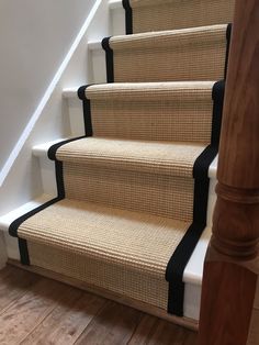 a stair runner with black piping on the bottom