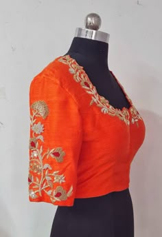 Pure raw silk blouse with fantastic all over zardosi embroidery. Custom fitted. -Measurements sheet will be sent to you once you order( Standard sizing also available) -Custom colors available -Work on front, back and sleeves. Please convo me if you're have any specific requirements. This blouse can be done with or without the bust cup inserts . The blouse is fully lined is cotton. Usual turn around time is 1-2 weeks, but we may be able to accomodate emergency requests if possible. Orange Blouse Designs Latest, Orange Color Blouse Designs, Orange Aari Work Blouse, Latest Maggam Work Blouses 2024, Raw Silk Blouse Designs, Orange Blouse Designs, Embroidery On Bags, Embroidery Khaka, Embroidery For Kids