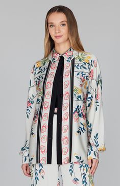 A softened take on a collared shirt. This blouse features soft, drapey dolman sleeves and a classic shirt collar. The Bramble print is beautifully placed to create elegant banding at the center front. Printed Silk Blouse For Daywear, Silk Printed Blouse For Daywear, Elegant Multicolor Blouse With Blouson Sleeves, Formal Silk Blouse With Print, Formal Silk Blouse With Printed Details, Elegant Multicolor Floral Print Shirt, Silk Printed Blouse For Workwear, Formal Silk Printed Blouse, Fall Silk Shirt With Floral Print