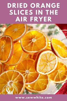 dried orange slices in the air fryer with text overlay that reads dried orange slices in the air fryer