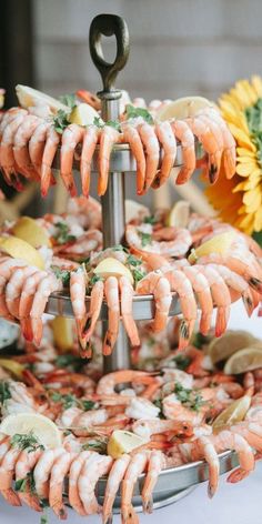 an assortment of seafood is displayed on a platter