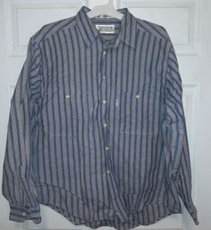 Levi's Silver Label Men's XL Blue Button Up Shirt Big E Mens Long Sleeve. Condition is "Pre-owned". Shipped with USPS First Class. Levis Denim Button Up, Levi's Classic Blue Shirt, Levi's Classic Button-up Top, Levi's Blue Shirt With Button Closure, Classic Blue Levi's Shirt, Levi's Blue Cotton Shirt, Levi's Blue Button-up Top, Levi's Blue Relaxed Fit Shirt, Levi's Button-up Tops With Button Closure