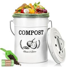 the compost can is filled with vegetables and spices