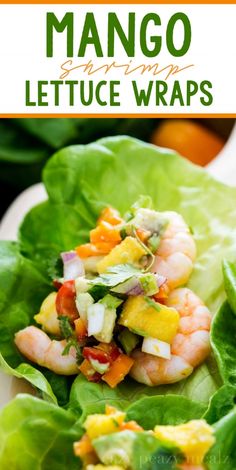 lettuce wraps filled with shrimp and mango salsa on top of lettuce leaves