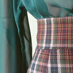 "ALEBERTINE MULTICOLORED TARTAN SKIRT a sheath dress Warning! We will prepare your chosen item immediately but we do not guarantee our usual super fast delivery. Items will be shipped no earlier than April 20th. If you order this item you agree to wait a variable time for delivery. The world situation is constantly changing due to the global epidemic. With your choice you support a small Italian artisan company. Thanks a lot. ALEBERTINE skirt. This item is handmade in tartan fabric. Wonderful Italian fabric. Soft but consistent hand. Suitable for the autumn winter season. The skirt is made in pencil model, with pleats both front and back. Equipped with a 5 cm high bustier, calculated with a high waist. The skirt has an opening on the back with a matching zip. Finished internally, with matc Green Pencil Skirt For Workwear In Fall, Elegant Plaid Skirt For Work, Elegant Fitted Plaid Skirt, Elegant Green Pencil Skirt For Office, Elegant Green Office Pencil Skirt, Elegant Green Mini Pencil Skirt, Fitted Green Pencil Skirt For Fall, Chic Fitted Plaid Skirt, Fitted Plaid Skirt For Office