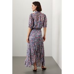 Blue floral cotton (100% Viscose). A-line. Short sleeves. Tie neck. Pull on. 53" from shoulder to hemline. Imported. Floral Print A-line Maxi Dress With Flowy Skirt, Floral Print A-line Flowy Maxi Dress, Flowy A-line Maxi Dress With Floral Print, Knee-length Flowy Midi Dress With Floral Print, Knee-length Floral Midi Dress With Flowy Skirt, Spring Floral Print Fit And Flare Dress, Casual A-line Floral Dress With Floral Print, Blue Flowy Feminine Dress, A-line Floral Dress For Casual Occasions