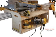 a table sawing machine with tools attached to it