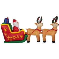 an inflatable christmas sleigh with two reindeers