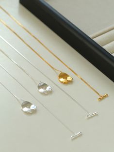 Discover our stunning "925 Silver Geometric Long Necklace" – crafted from S925 silver for durability and timeless elegance. Its versatile geometric design adds a touch of modern sophistication to any outfit with its total length of 74cm. Elevate your style with this must-have accessory! Metal: 18K Recycled Gold Plated Vermeil on Recycled Sterling Silver/Recycled Sterling Silver Necklace Length: 74cm Weight: 13g Modern Sterling Silver Necklace, Tarnish Resistant, Modern Sterling Silver Long Drop Necklace, Modern Sterling Silver Tarnish-resistant Necklace, Modern Long Drop Sterling Silver Necklace, Gold Sterling Silver Long Drop Necklaces, Long Necklaces, Necklace Craft, Recycled Gold, Recycled Sterling Silver