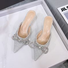 Overview:
 
 Unique design, stylish and beautiful.
 
 Good material, comfortable feet.
 
 A variety of colors, any choice.
 
 
  
 

Specification:

Color: white satin, black satin, pink satin, silver flash silver, flash pink, flash blue/greenish
 
 Size: 34,35,36,37,38,39,40
 
 Upper material: Glitter
 
 Sole Material: Rubber
 
 Inner material: microfiber
 
 Heel height: 6cm

 
 
 
 
 
 Package Content:
 
 1 pair x shoes Silver Pointed Toe Sandals For Prom, Glamorous Silver Flat Heel Sandals, Glamorous Silver Flats, Boho Wedding Shoes, Summer Pumps, Silk Fashion, Female Shoes, Fur Shoes, Rhinestone Bow