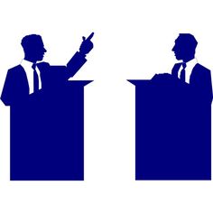 two men in suits are standing at podiums and one is pointing to the sky