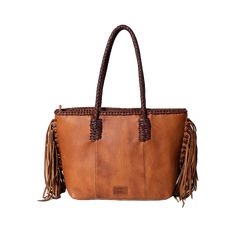 Style number: ADBGM276B. Brown western tote bag. Genuine full grain leather. Handpicked cowhide hair-on. Leather fringed detailing. Accented turquoise center stone. Detailed leather braiding. Long lasting and durable zipper closures. Multiple inside pockets. Measures: 12in (H) X 18.5in (W) X 4.5in (D). Leather Fringe Hobo Bag For Shopping, Leather Shopping Bag With Fringe, Leather Fringe Shoulder Bag For Shopping, Leather Shoulder Bag With Fringe For Daily Use, Leather Fringe Hobo Bag For Daily Use, Daily Use Leather Hobo Bag With Fringe, Bohemian Tote Bag With Leather Backing, Bohemian Leather-backed Tote Bag, Bohemian Leather Tote Bag