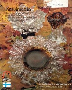 a magazine cover with autumn leaves and vases on the front, as well as an advertisement for kasuvmaalaa