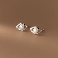 s925 sterling silver pearl studs retro earrings Precious Gift for Christmas, Birthday, Graduation, Wedding, Bridal Shower, Baptism, Anniversary, Party, and First Communion. Eternal Memories: Express love to your girlfriend, partner, wife, daughter, mother, bride, and new mother. Exquisite Craftsmanship:  handmade Free Shipping: Royal Mail or Yodel Fast Delivery within the UK Complimentary Box: Free packaging box Quality Materials: 925 Sterling Silver Our products meet high standards, crafted by skilled artisans using hypoallergenic 925 sterling silver. Perfect for everyday wear. * Elegant Packaging The necklace comes in a beautifully crafted gift box, ensuring satisfaction with our packaging! Optionally, I can include a personalized gift message. * Easy Returns We gladly accept returns or Dainty Silver Pearl Earrings For Formal Events, Silver Dainty Pearl Earrings For Formal Occasions, Dainty Silver Pearl Earrings For Formal Occasions, Pearl White Sterling Silver Pearl Earrings, Dainty Silver Pearl Earrings For Pierced Ears, Silver Dainty Pearl Earrings With Cubic Zirconia, Silver Cubic Zirconia Dainty Pearl Earrings, Silver Sterling Silver Pearl Earrings, Dainty Silver Pearl Earrings With Cubic Zirconia