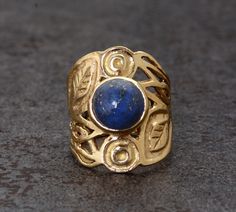 SIZE :- All Size Are Available. US1 TO US16, If Your Size Not Listed Feel Free to Contact us METAL :- Brass STONE;- Lapis Lazuli Ring can be customized on request and gemstone can be made to any gemstone you want. Same Design Ring Are Upload With Any Gemstone. Please Visit Our Shop to View Complete Collection. If You Need Faster Shipping, Please Contact us Please Make Sure to Include The Correct Address During Before Order. You Can return Item within 30 Days After Successful Delivery. We Offer 1 Bohemian Yellow Gold Jewelry For Anniversary, Handmade Nature-inspired Yellow Gold Rings, Gold Adjustable Nature-inspired Rings, Bohemian Brass Jewelry For Anniversary, Handmade Adjustable Antique Rings, Nature-inspired Brass Rings For Gifts, Bohemian Gold Rings With Gemstones, Bohemian Metal Ring Jewelry For Anniversary, Bohemian Brass Rings For Anniversary