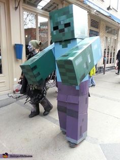 a man in a costume made to look like minecraft is walking down the street