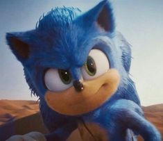 sonic the hedgehog from sonic the hedgehog is looking at something in front of him