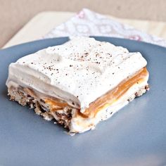 a piece of dessert sitting on top of a blue plate