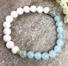 "✦Gemstone: Aquamarine and Moonstone ✦Color: Blue and Clear ✦Shape: Round ✦Length: 5''-9'' ✦Bead Size: Round Bead: 8mm ✦QTY: 1 pcs / package ✦✦Please measure your wrist size, then order the bracelet. 8mm Moonstone Bracelet, Aquamarine Bracelet, Crystal Bracelet, Stretchy Bracelet, Healing Jewelry Valentine's Day Gift There are main moonstone powerful meanings. 1. It's considered a shining light 2. Helps you feel empowered when making decisions 3. It can influence your love life 4. It opens the h White Gemstone Crystal Bracelet For Jewelry Making, White Amazonite For Jewelry Making, White Amazonite Bracelets With Natural Stones, White Amazonite Bracelet With Natural Stones, Gift Blue Moonstone Beaded Bracelets, Moonstone Crystal Bracelet With Round 8mm Beads, Aquamarine Gemstone Bracelets For Healing, White Jade Crystal Bracelet With Natural Stones, White Jade Crystal Bracelet For Healing