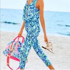 Lilly Pulitzer Women's Paulina Multi Blue Print Sleeveless Jumpsuit Size Xs. The Paulina Jumpsuit Can Take You From An Afternoon Of Shopping With Friends To A Night Out Shaking It On The Dancefloor With A Quick Shoe Change. Wherever You Wear It, You Will Be Chic And Comfortable In This Racerback Playsuit. V-Neck Jumpsuit With Racerback And Tapered Leg Pants. I Purchased This Gorgeous Piece Recently During An Official Online Lilly "After Party Sale." Since I Couldn't Try It On It, Unfortunately,