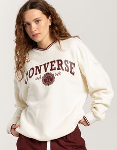 Converse Retro Oversized V-Neck Sweatshirt. Layer Up In Signature Converse Style. This Soft Fleece Crew Brings A Collegiate Vibe To Any Outfit With Bold, Varsity Graphics. A Roomy Fit And Dropped Shoulders Keep Your Look Laidback, Comfortable, And Ready For Anything. Soft Fleece Helps Keep You Warm. Ribbed Cuffs And Hem Taper The Fit. 80% Cotton, 20% Polyester. Machine Wash. Imported. Model Is Wearing A Size Small. Model Measurements:height: 5'7" Bust: 29"waist: 22"hips: 34.5" Converse Sweatshirt, Flannel Sweatshirt, Converse Style, College Sweatshirt, Mens Trends, Open Knit Sweater, Future Fashion, Sweaters And Jeans, Hoodie Girl