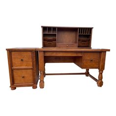 an old wooden desk with two drawers and a bookcase on it's top