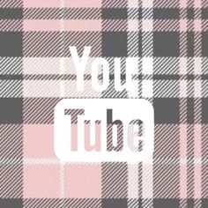 a pink and black plaid pattern with the words you tube in white on top of it